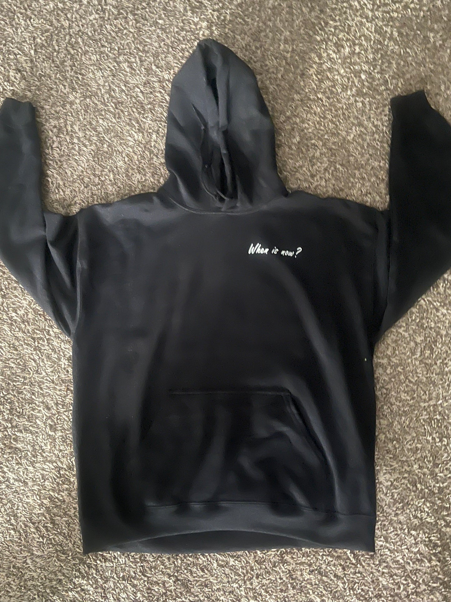 when is now? black hoodie